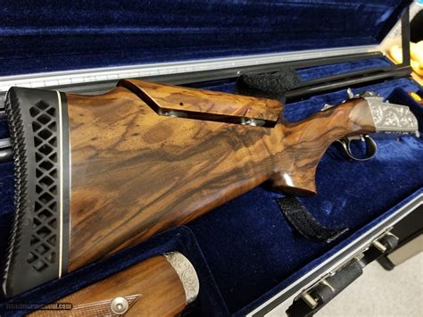 34" Unsingle barrel with tapered step rib and factory steel chokes. . Krieghoff k80 trap combo